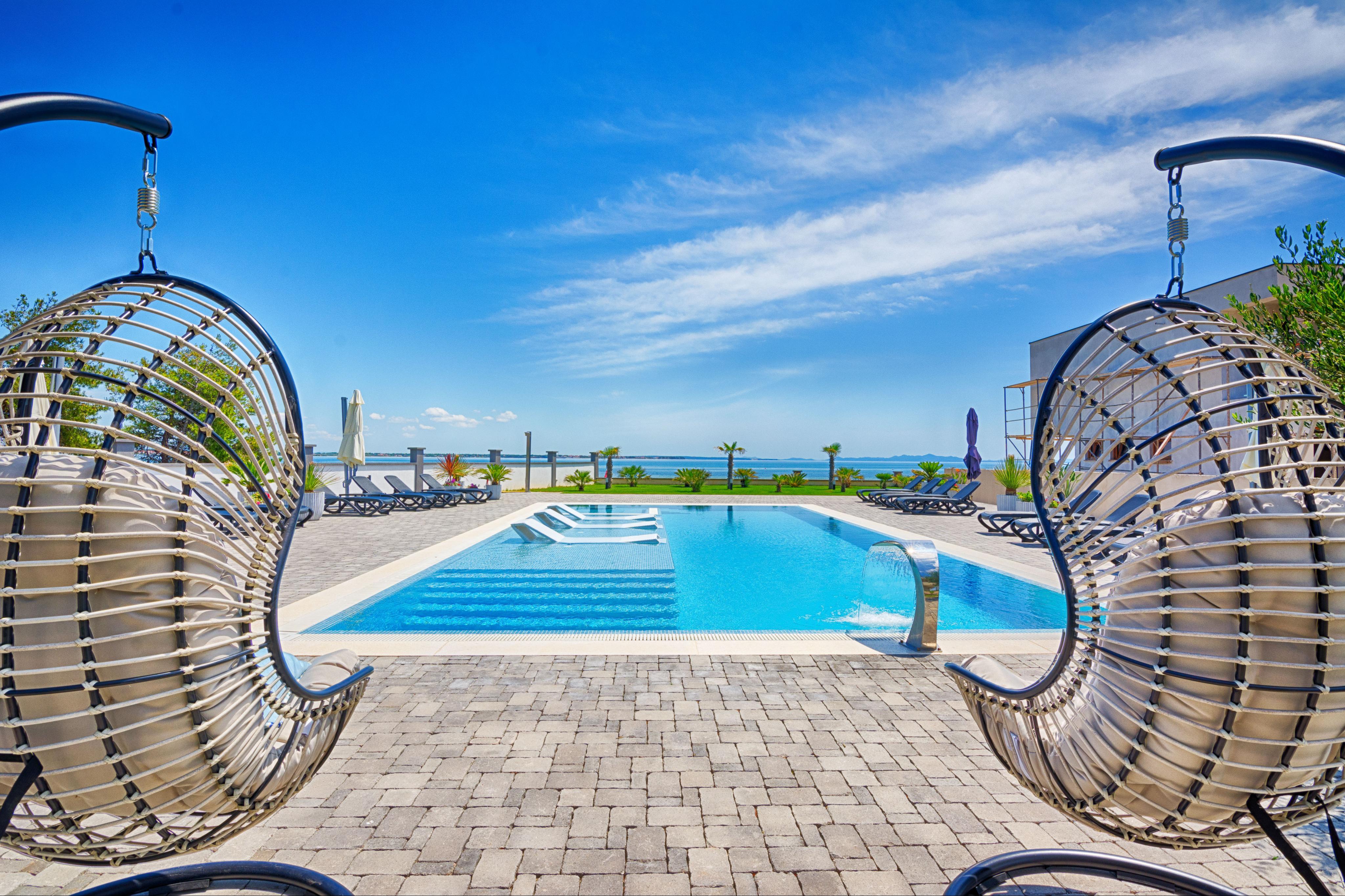  4-Sterne-Wohnung. Top modern mit Terrasse und direkt am Strand