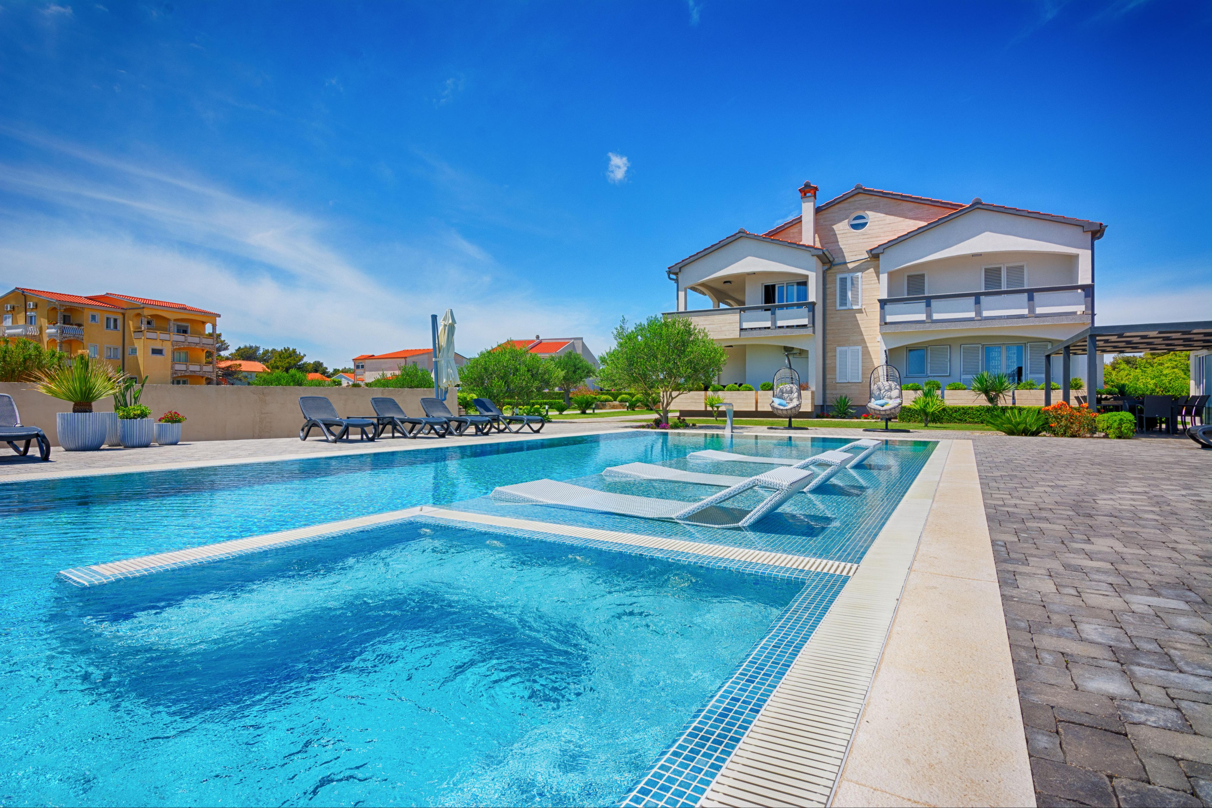  4-Sterne-Wohnung. Top modern mit Terrasse und direkt am Strand
