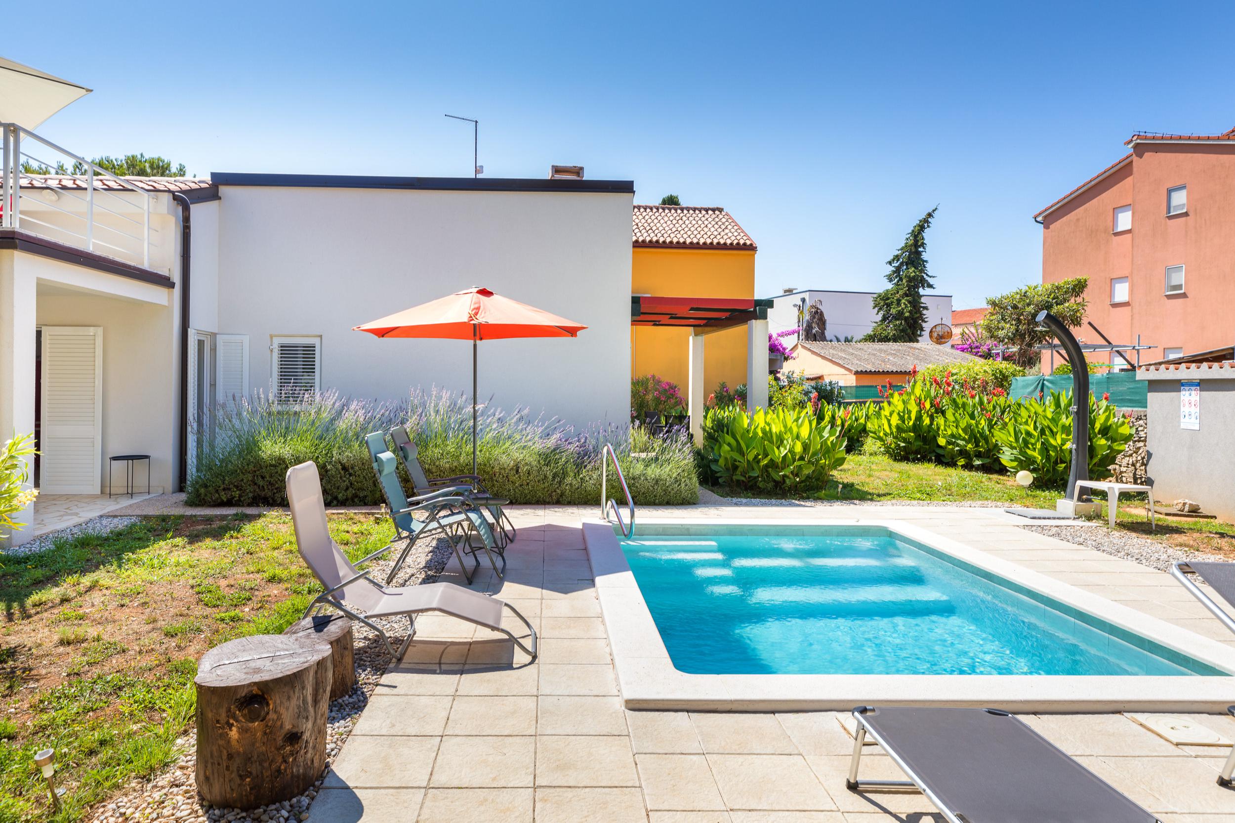 Ferienhaus mit Pool in Premantura