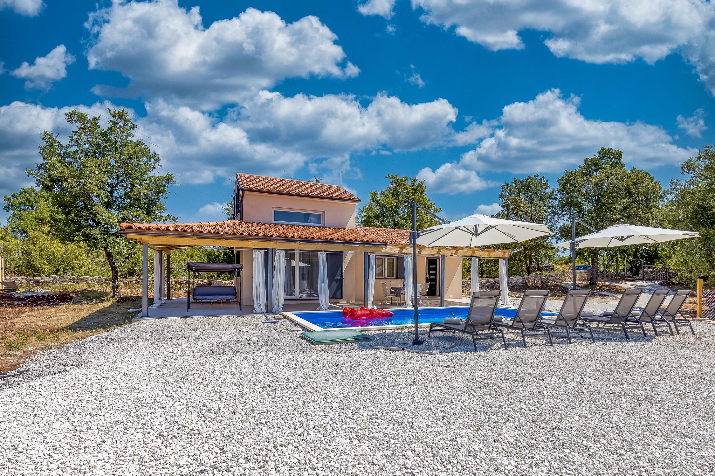 Ferienhaus mit einem privaten und beheizten Pool