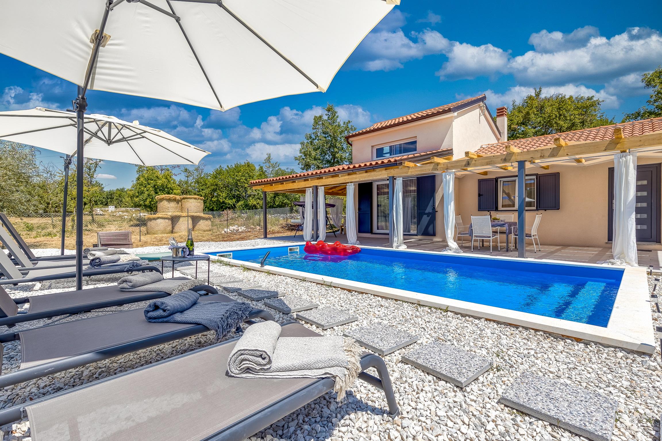 Ferienhaus mit einem privaten und beheizten Pool