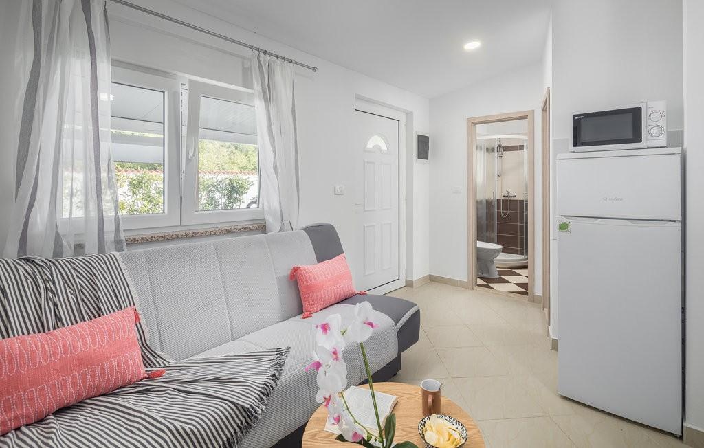 Ferienhaus mit Terrasse, Grill, Klimaanlage & Gemeinschaftspool
