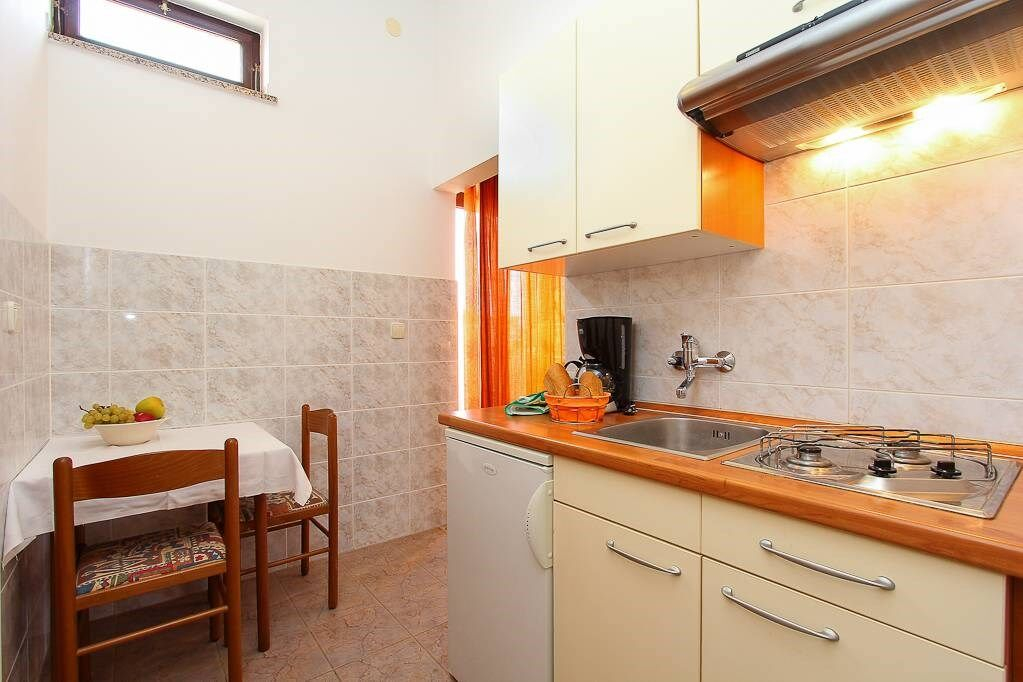 Studio im Dachgeschoss mit Klimaanlage und Grillmöglichkeit